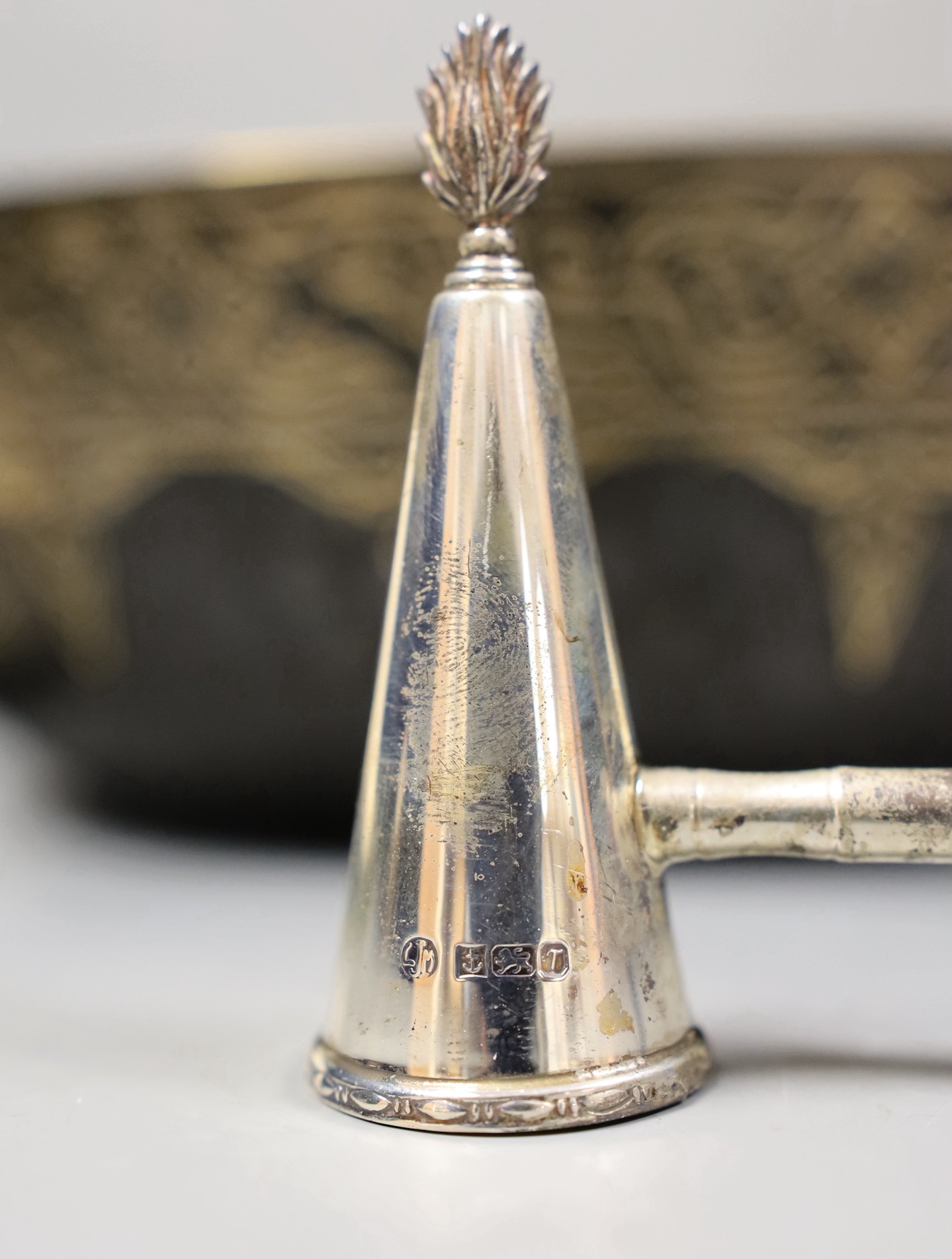 Assorted silver and other items including two silver mounted photograph frames, a Georgian silver mustard by John Eames, a graduated suite of three Victorian silver mounted horn beakers, a silver candle extinguisher, a c